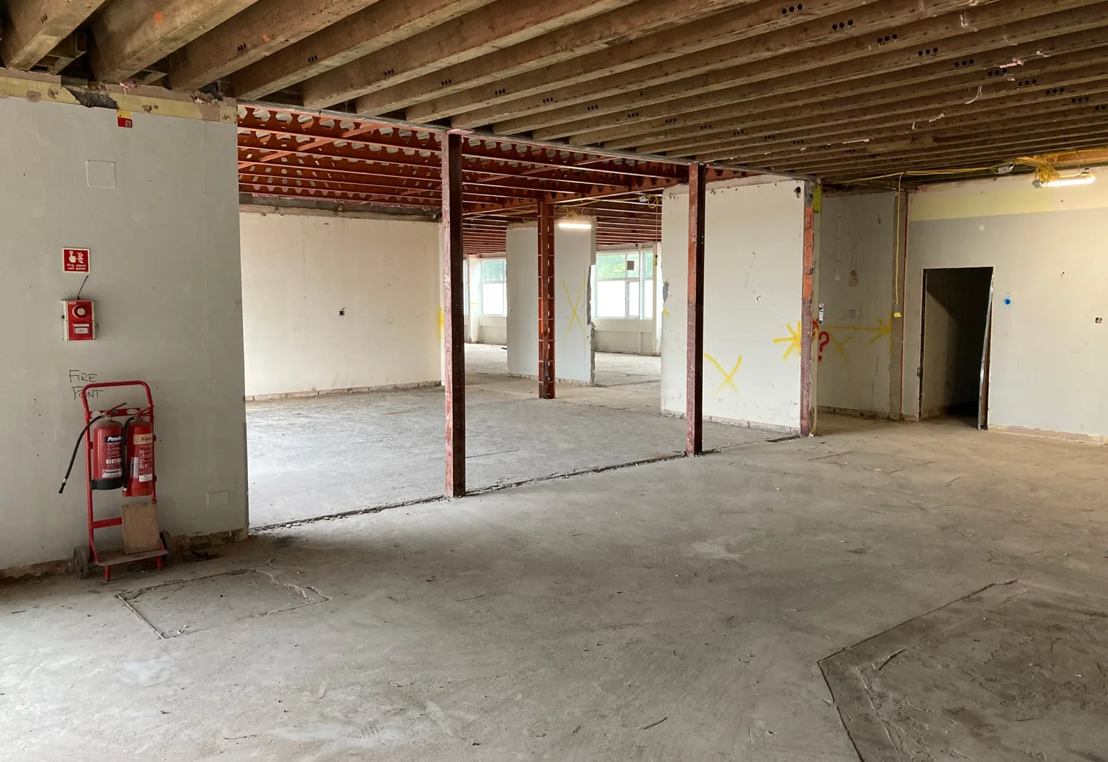 Stripped interior of a commercial building after selective demolition