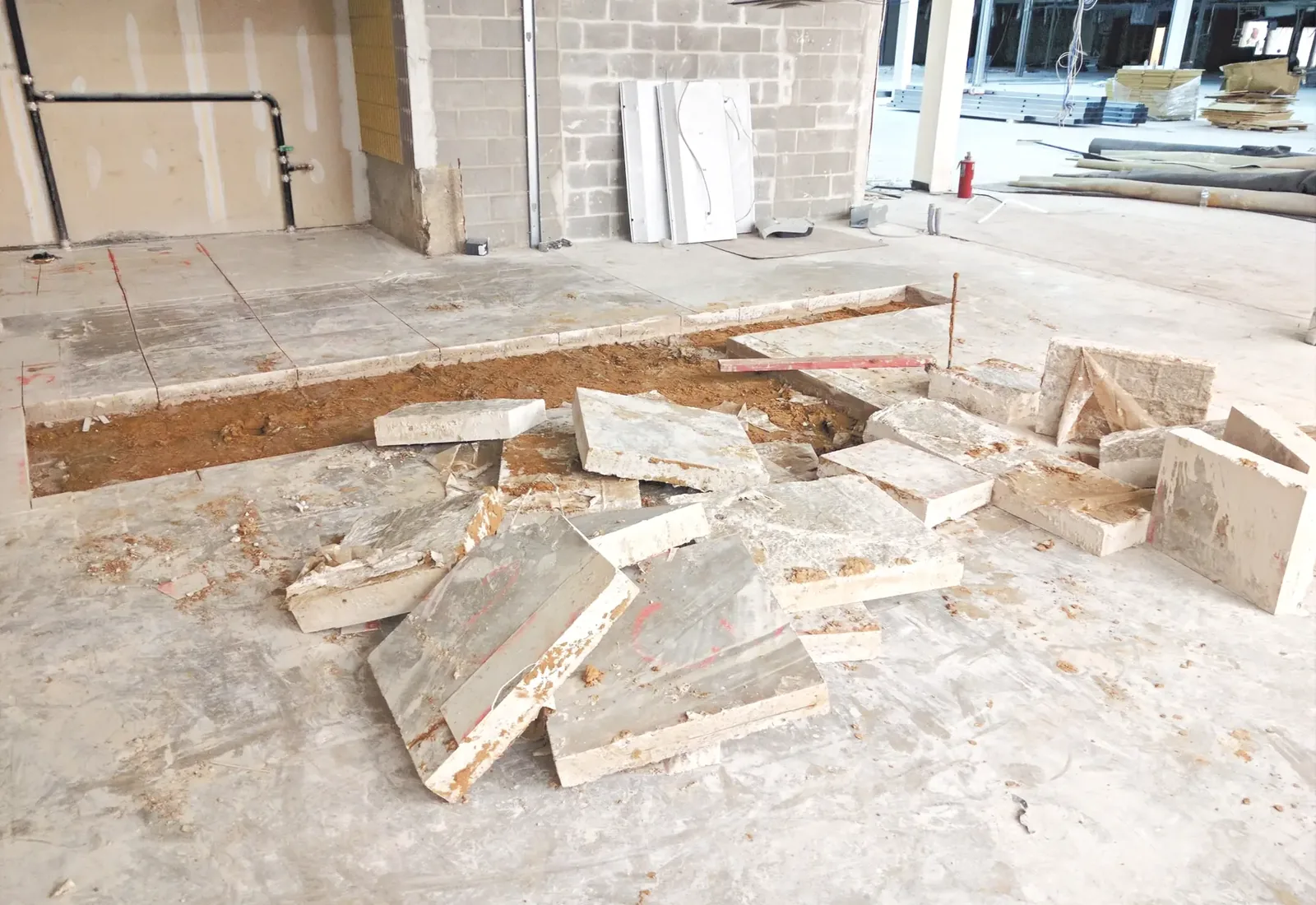 Pile of broken concrete slabs stacked after a floor was taken out