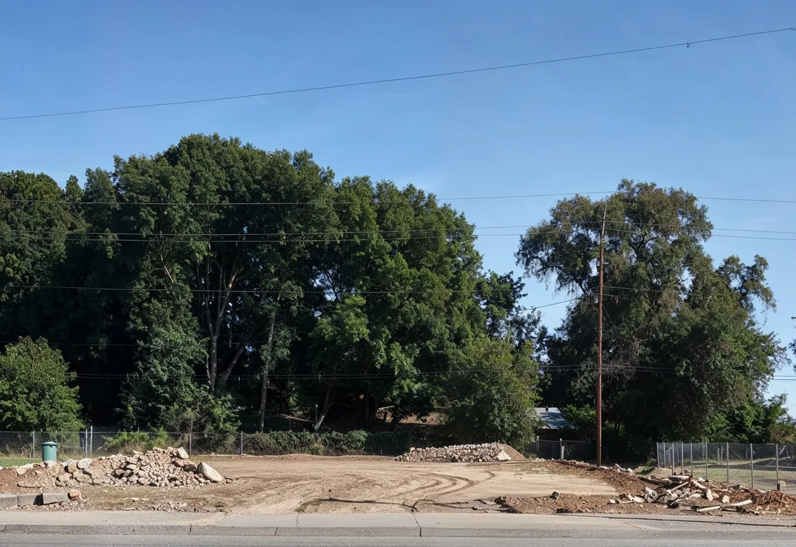 Cleared and graded dirt lot after a building was taken down