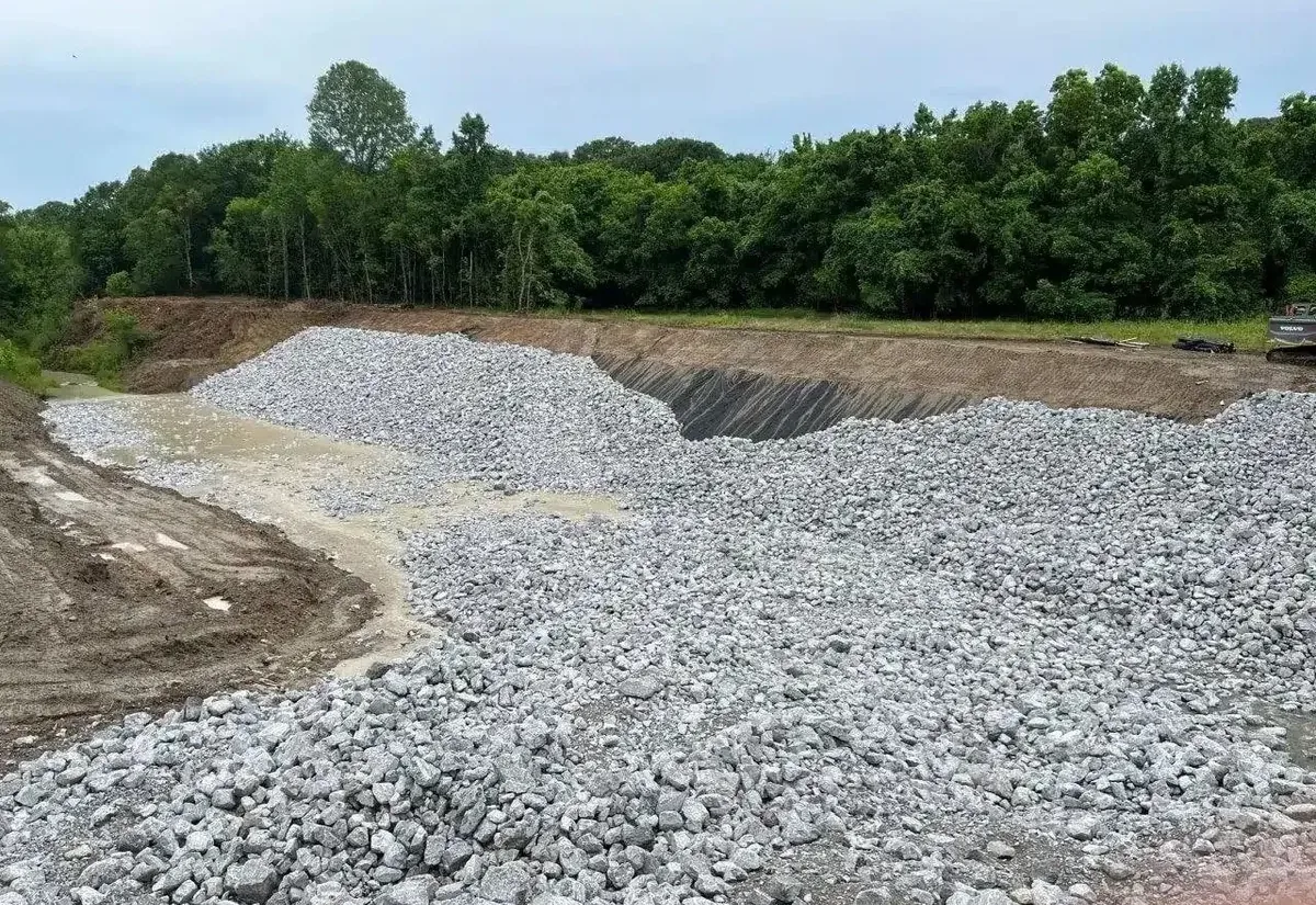 Large stockpile of crushed base material delivered on a site